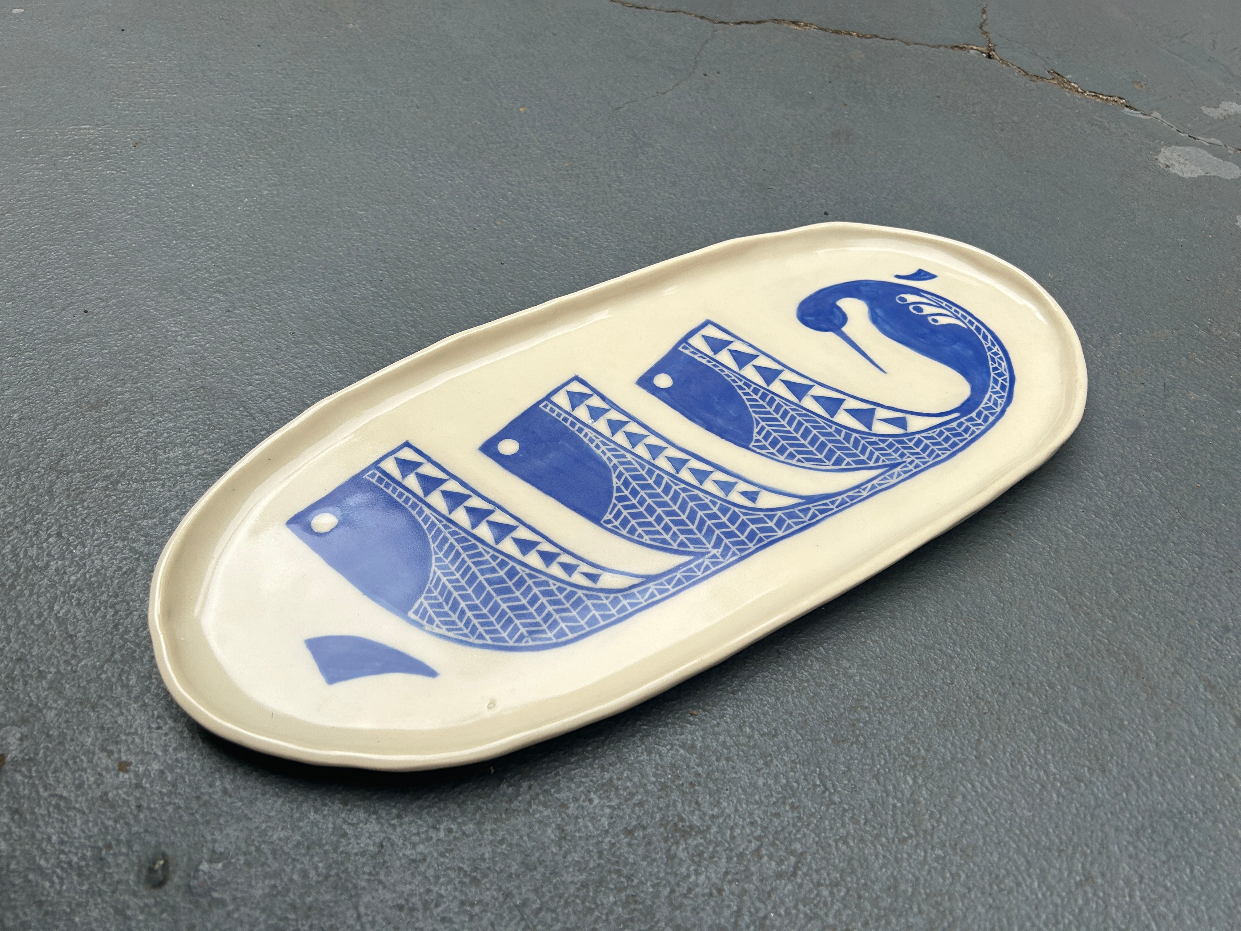 painting of whale in shipyard